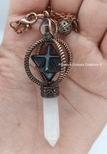 Load image into Gallery viewer, Pendule Merkaba cuivrés ou argentés